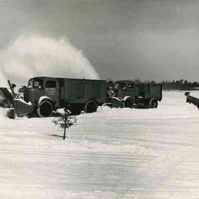 Snowplows and Tractor at Airport.