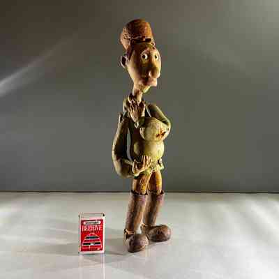 5.4.25i Stop-Motion Puppet, Thoughtful Wood-Grain Character (Possible Fairy Tale Figure)