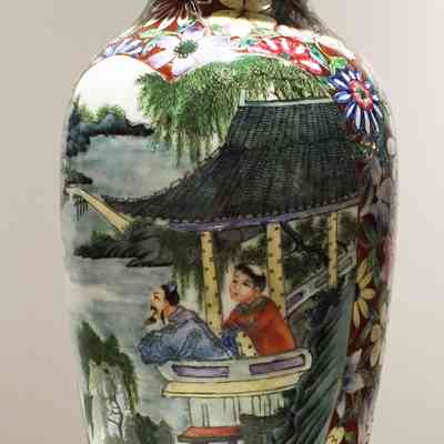 Hand-painted porcelain vase with flowers and scenes front and back