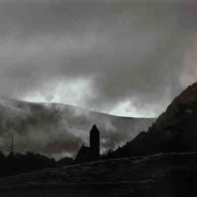 Old Church in Field with Fog