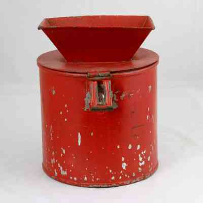 27,502 - LARGE, RED TZEDAKAH DONATION WITH LARGE FLUTED TOP SLOT.