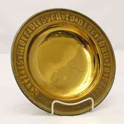 17,021 - A GIFTED CHURCH OFFERING PLATE WITH ENGRAVED ROPE TRIM