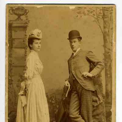 Studio photograph of a couple wearing hats by Davis of Richmond, VA and Washington DC