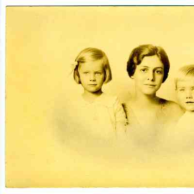Studio photograph of mother and children