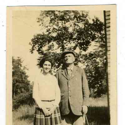Photograph of a young woman and an older man