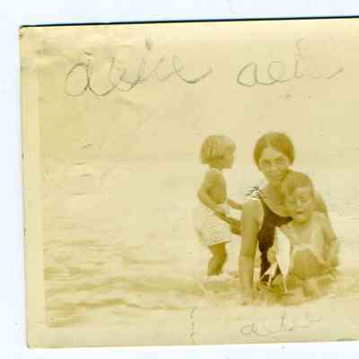 Photograph of a woman and man with 4 children