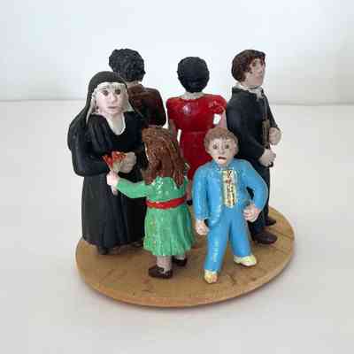 UNTITLED (FIGURES ON WOOD CIRCLE)