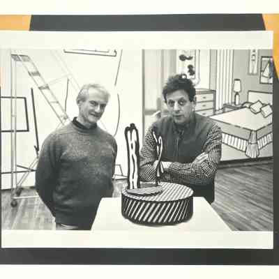 Roy Lichtenstein and Philip Glass in Lichtenstein's studio, 1991; photographed with their collaboration, Modern Love Waltz, a bronze music box sculpture that plays an original composition by Philip Glass; Getty Research Institute, Barbara Rose papers, 2014; Seq #5