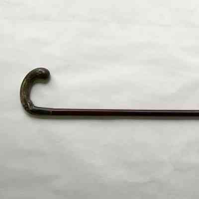 CANE WITH ENGRAVED HANDLE