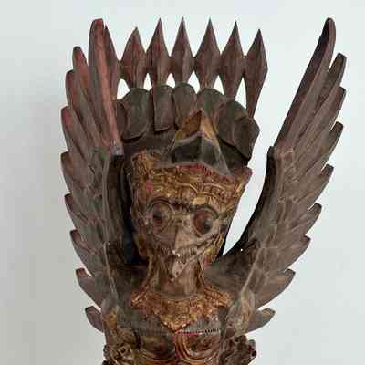 WINGED FIGURE ON BIRD