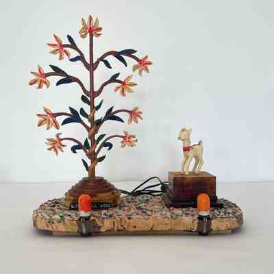 CARVED FLOWER AND PLASTIC DEER