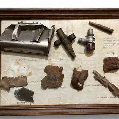 Framed plane and shells fragments, France