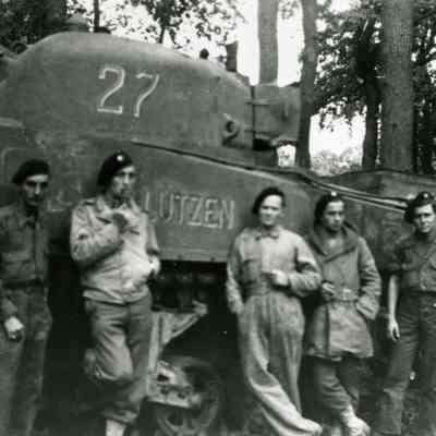 The crew of Lützen at Pré Catelan in the Bois de Boulogne, Paris, août 1944. Left to right; Marcel Guénan, Driver, Maurice Carlier, Tank Commander, S/Lt. Jean Lacoste, Commander of Friedland and Commander of the Second Platoon, Marcel Le Gall, Co-Driver, Maurice Darne, Gunner and Henri Mathieu, Radio/Loader. This photo is copyright, from the collection of Maurice Darne