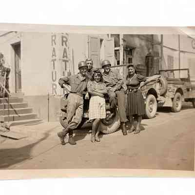 Lot of two pictures, GIs with a Jeep and civilian girls