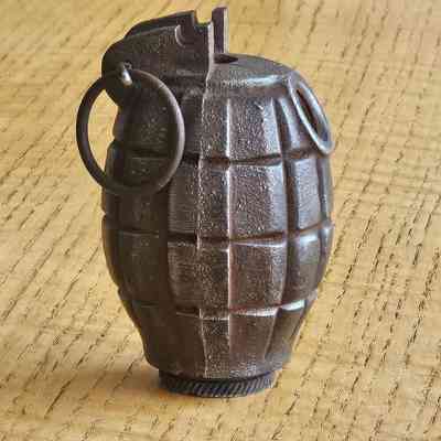 No. 36 Mk I Grenade, which was a standard British fragmentation grenade. Historical Significance: Used in both World War I and World War II, remaining in service until 1972.