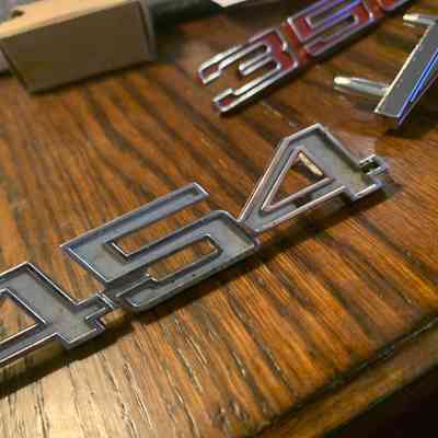 454 emblem take-off part pn p39632 early 70's vehicle
