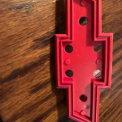 Red Bowtie Grill Emblem year/model unknown