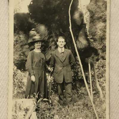 Man and Woman in front of Bear Pelt