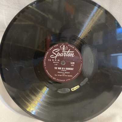 'The Man in a Raincoat; I Wanna Dance to a Mambo Combo' Record