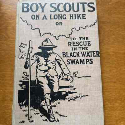 Boy Scouts on a long hike or to the rescue in the Black Water Swamp