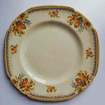 Small Saucer with Yellow and Blue Trim and Flowers