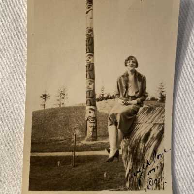 Woman in front of Totem