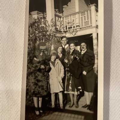 Group Standing in front of house