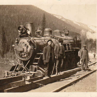 Steam Engine with Three Men