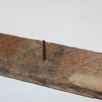 Early wooden lathe with square nails