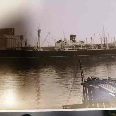 Steamship in dock. Photograph.