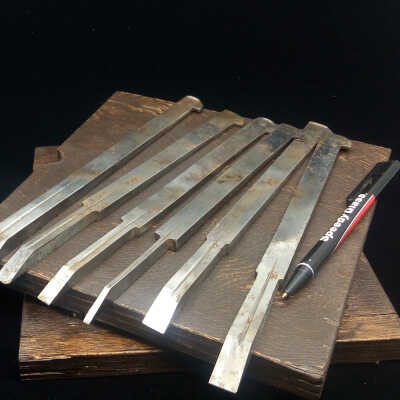 The Cutter Set.  In this picture the tops of 3 cutters clearly show the rounding caused by use of a steel hammer to adjust them in the plane.