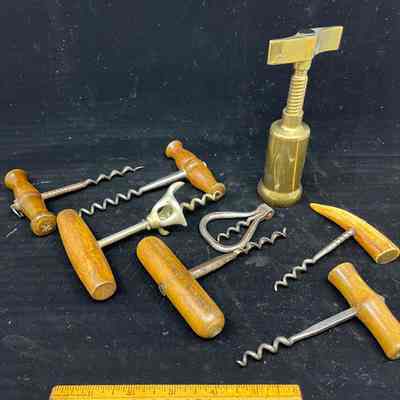 Various antique bottle corkscrews