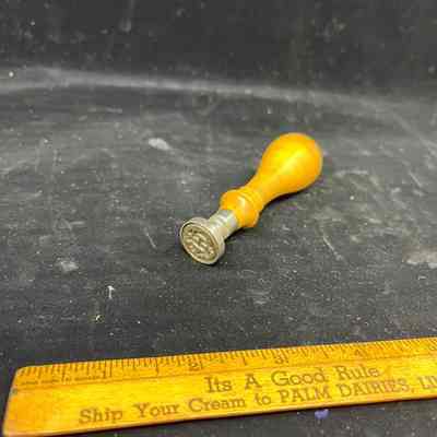 Small metal stamp