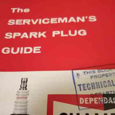 Serviceman's spark plug guide