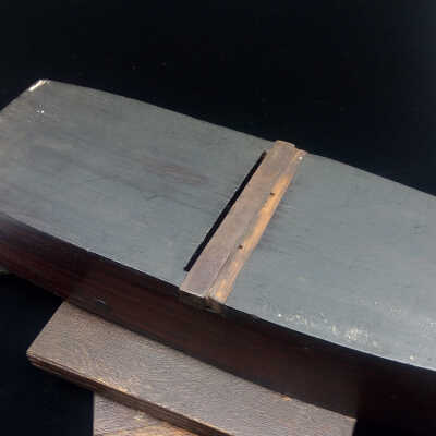 The mouth insert and its hardwood wedge.