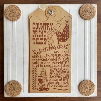 Tile back with Country Print Tiles label hanger and cork pads.