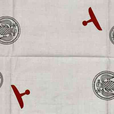 Interstitial print at center of tablecloth.