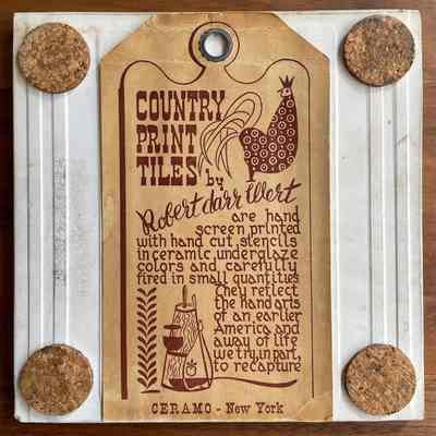 Tile back with Country Print Tiles label hanger and cork pads.