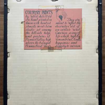 Back of framed bird print with pink Country Prints story card.