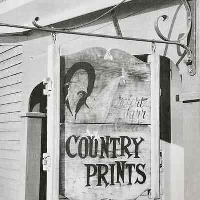 Country Prints sign attached to the exterior of the silkscreen studio, early 1960’s.: Image: Collection of Sara Leeper.