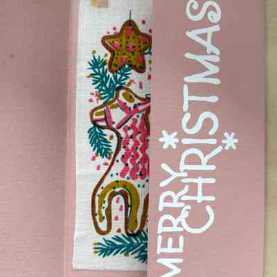 Left side open revealing Merry Christmas greeting.