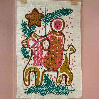 Fully open revealing print of Mary on a donkey with the Christmas star above.