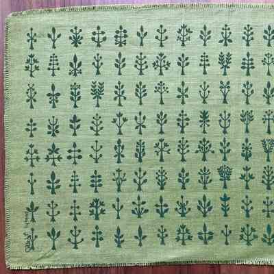 It is possible the matching napkin would be a brown version of this napkin design, like the rest of the Bottled Herbs 107 placemat sets.