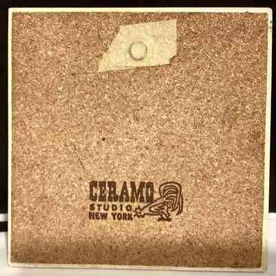 Tile back with Ceramo Studio imprint.