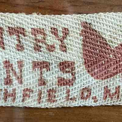 Country Prints Northfield Mass product tag attached to placemat.