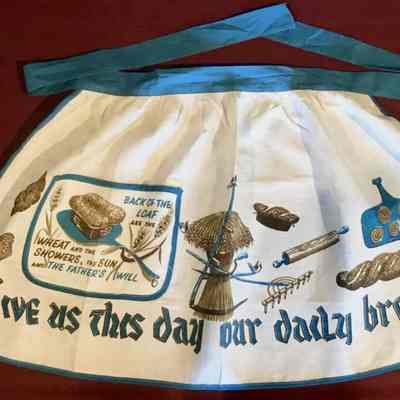 Matching apron: Daily Bread in blue.: Image: unknown eBay.com vendor