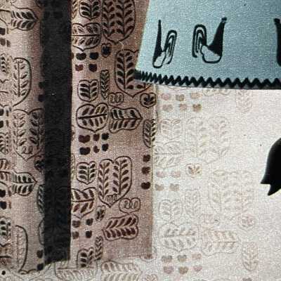 Wallpaper on a roll, light colored print behind matching fabric.: Cropped from full image below.