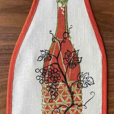 Matching 280 or 284-7 bottle cover in orange.: PKM collection.