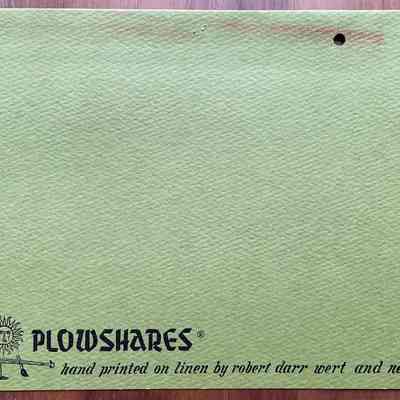 Back of sign showing Plowshares imprint.
