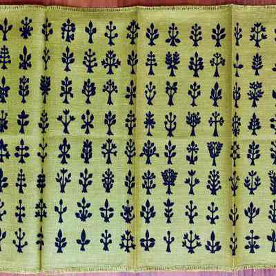 Herb green napkin with black printing.